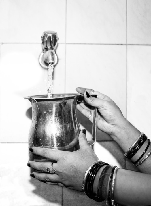 Varied drinking water sources in India - private tap water source in South-East district, National Capital Territory of Delhi
